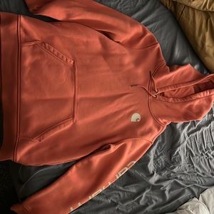 Carhart Women’s hoodie only worn once. Size large. Pinkish orangish